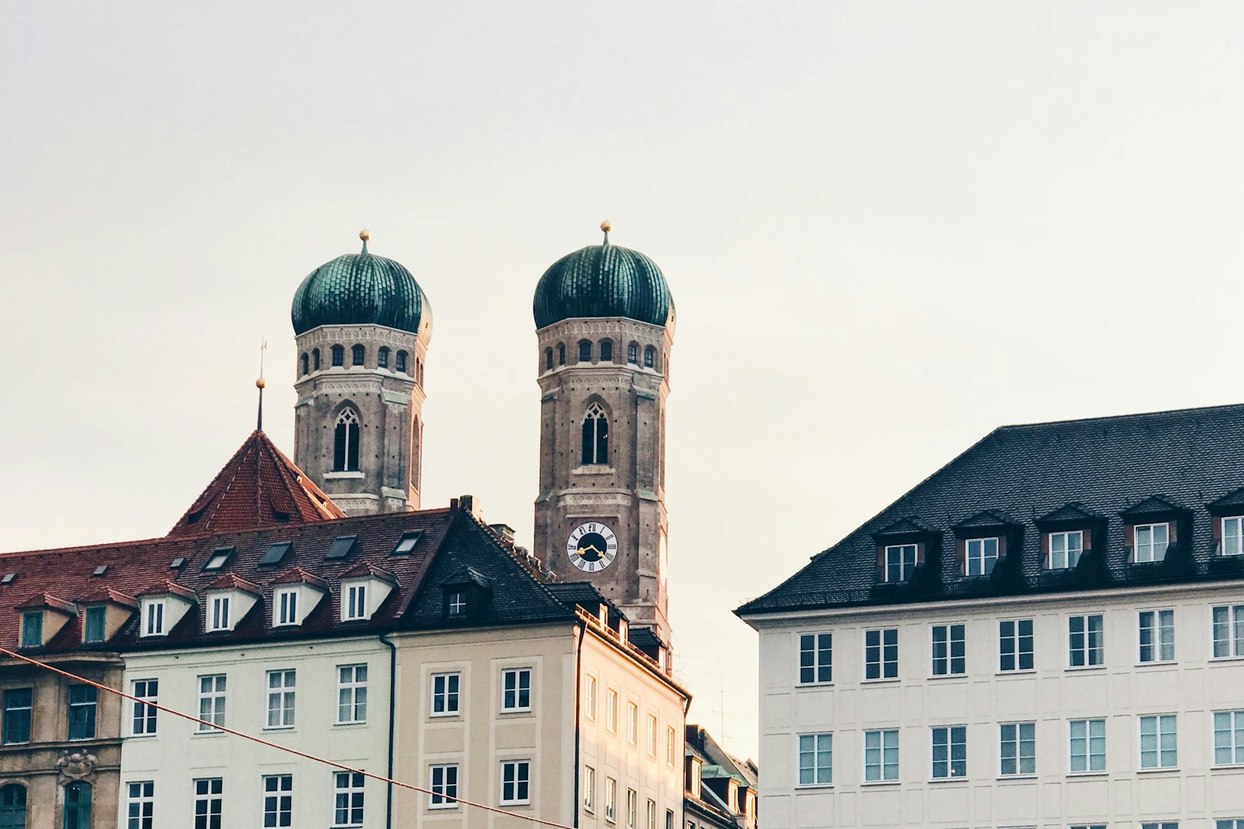 The twin domed towers of Munich’s Frauenkirche above neighbouring rooftops